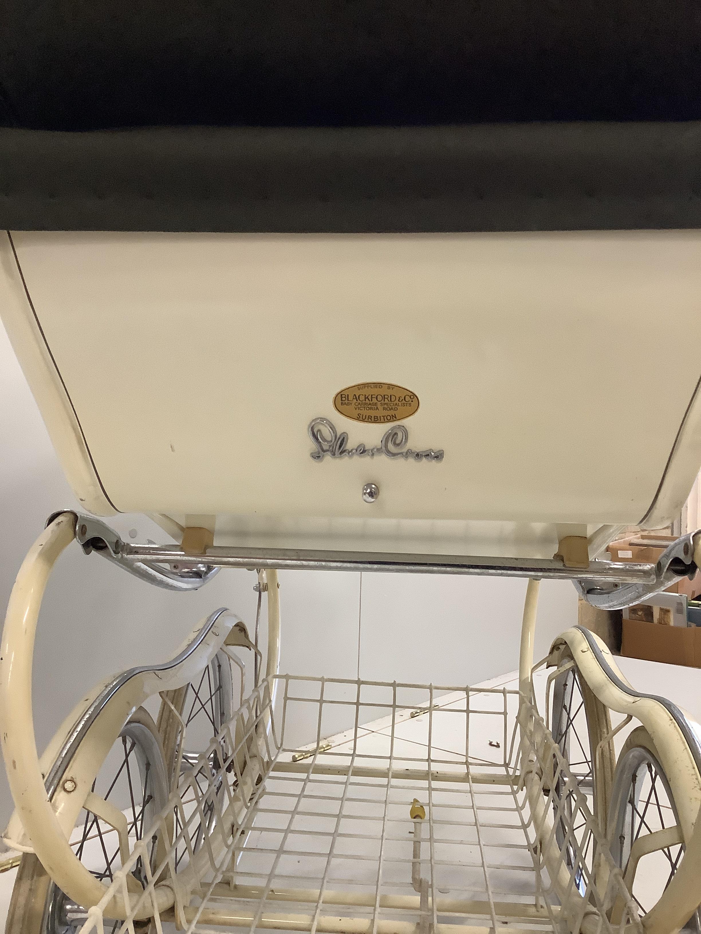 A vintage Silver Cross pram, height 112cm